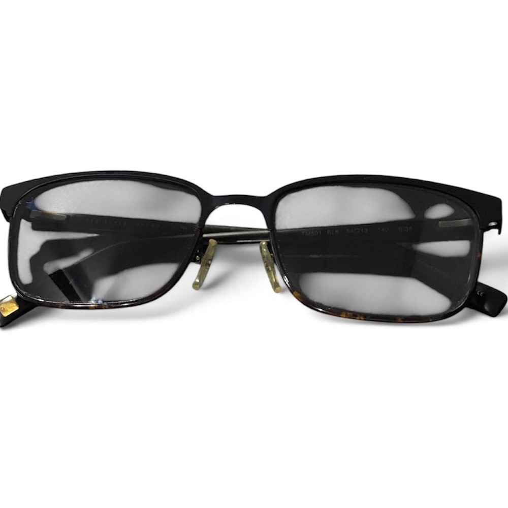 Ted Baker TM501 BLK Eyeglass
Frames Black Metal Rectangular TM501 54-18-140